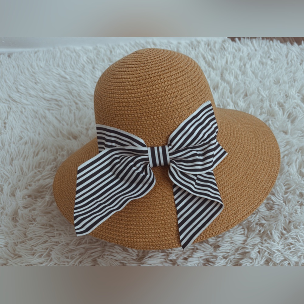 Stylish Tan Sun Hat with Black and White Striped Bow